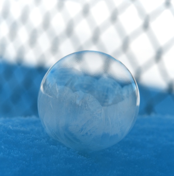 frozen soap bubble in front of