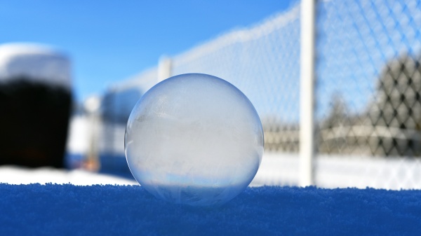 frozen soap bubble in front of