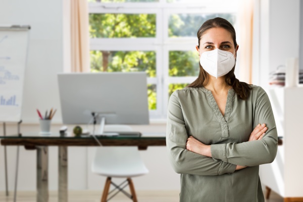 receptionist business woman wearing face mask