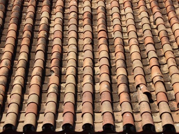 old tile brick roof with ending