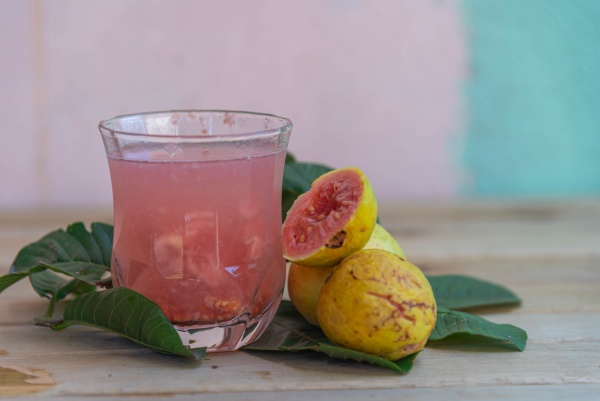 guava detox juice on wooden background