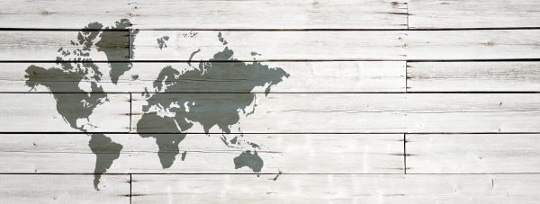 world map on white wooden wall