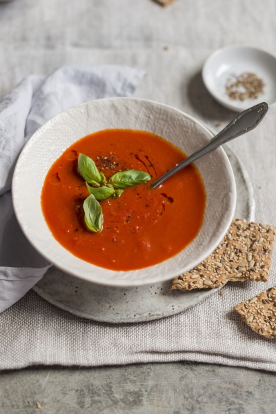 tomato soup with fresh basil in