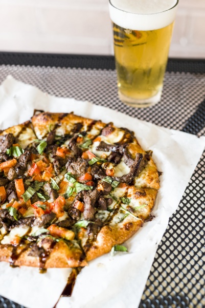 caprese beef pizza with balsamic drizzle