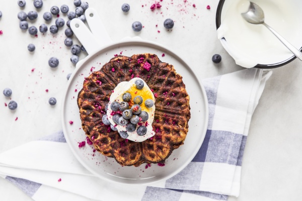pumpkin waffles with blueberries and yoghurt