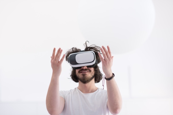 man using headset of virtual reality