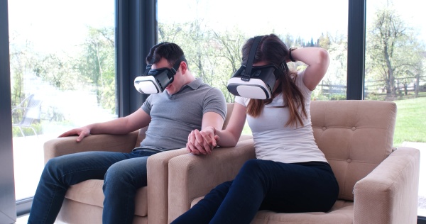 couple using virtual reality headset