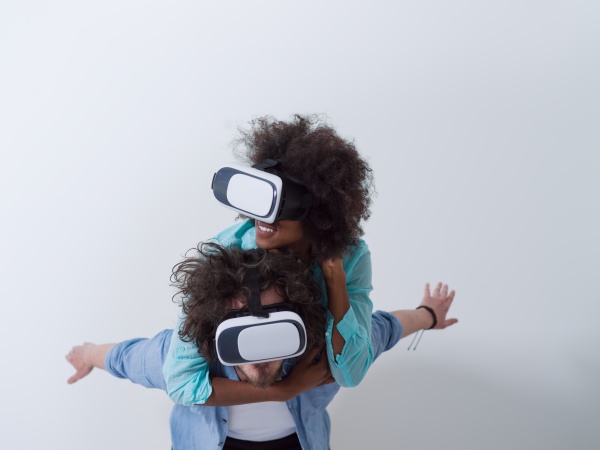 multiethnic couple getting experience using vr