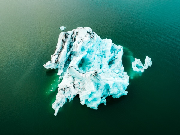 aerial view of iceberg floating in
