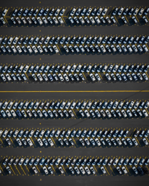 aerial view of imported cars parked