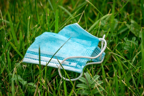 facial surgical mask used and thrown