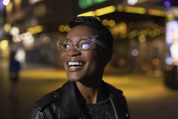happy young woman in funky glasses