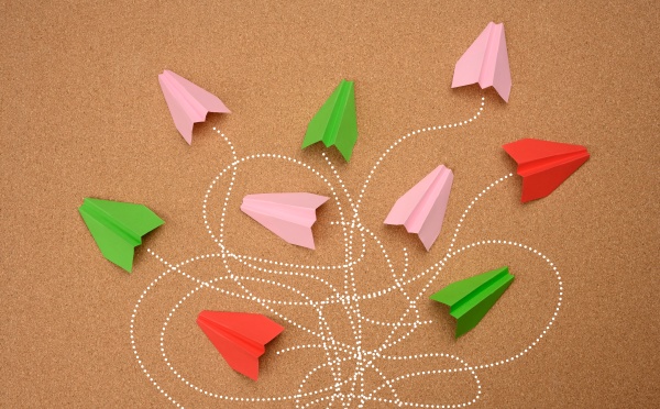group of multicolored paper planes with