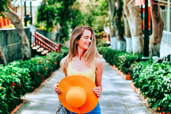 a beautiful blonde woman holding an