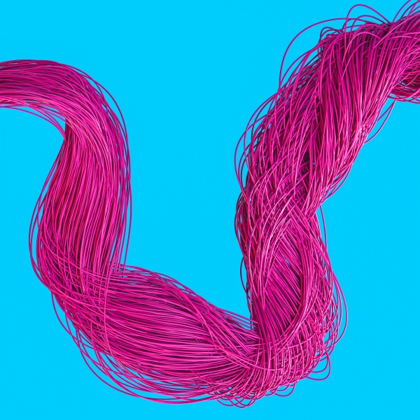 fuchsia colored cables intertwined on a