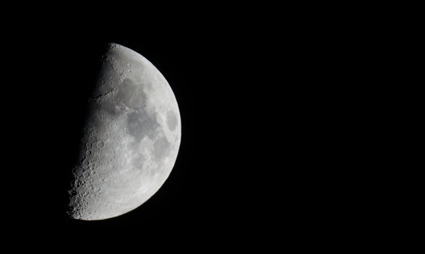 half moon seen with telescope