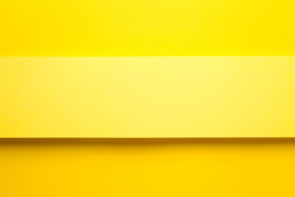 yellow paper banner on yellow paper