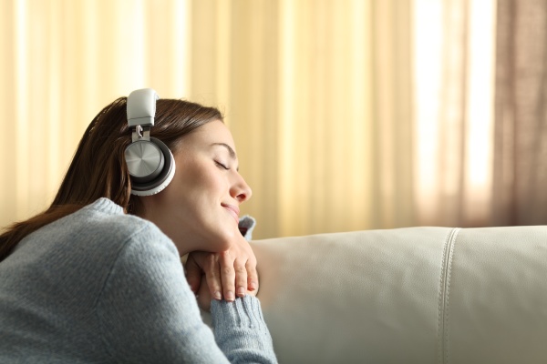 relaxed woman resting listening to music