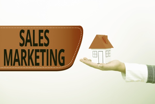 sign displaying sales marketing business