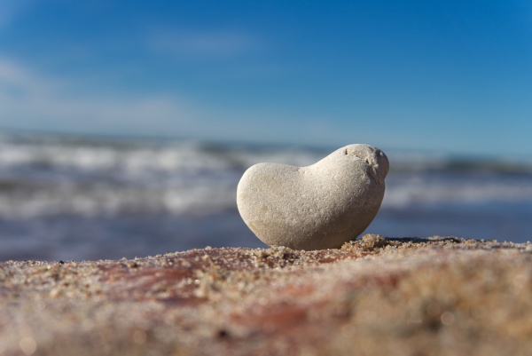 heart shaped rock balanced at the