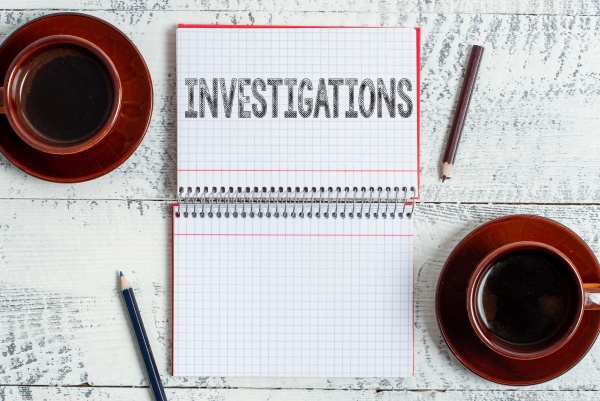 text caption presenting investigations business