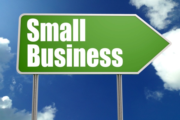 small business word with green road