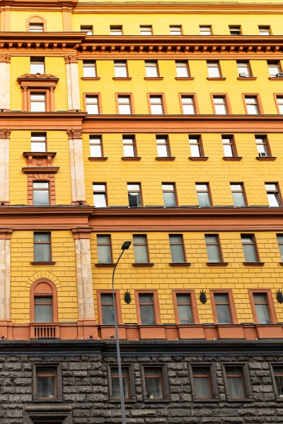yellow facade of building of federal