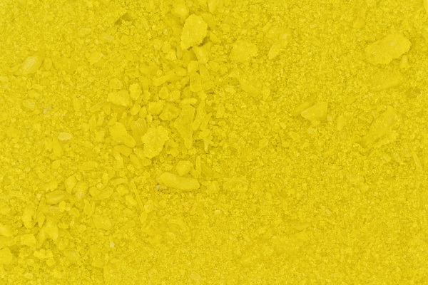 small bright yellow crystals of sodium