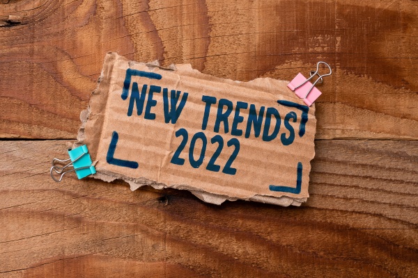 hand writing sign new trends 2022