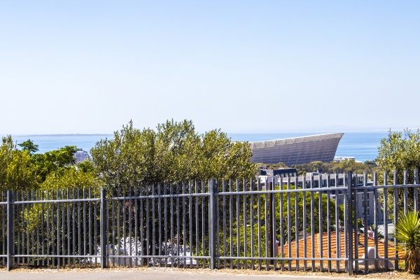 cape town stadium behind fence in