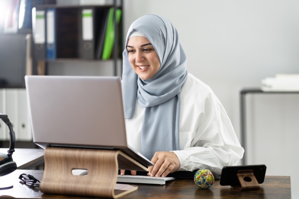 woman wearing hijab in virtual interview