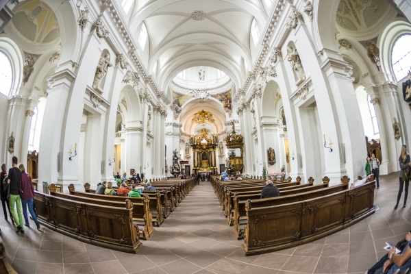 people inside of baroque cathedral in