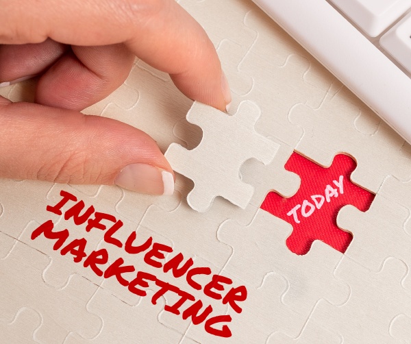 text sign showing influencer marketing