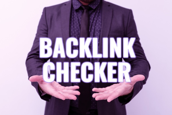 hand writing sign backlink checker