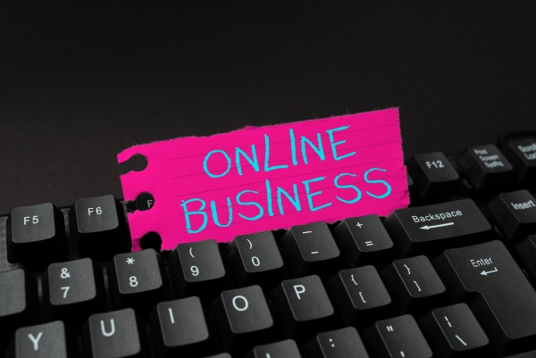 sign displaying online business word