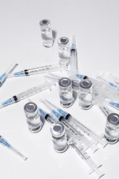 covid 19 vaccine vials and syringes