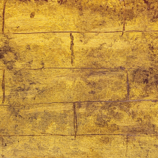 detail of gold brick wall hand