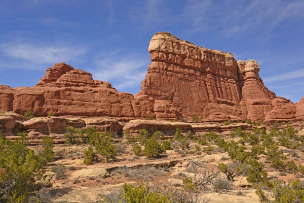 sandstone wall rising from the desert