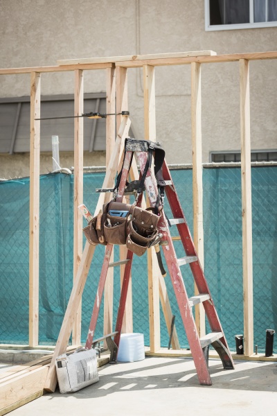 tool belt hanging on ladder at
