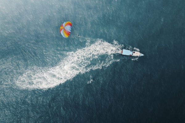aerial view of person parasailing from