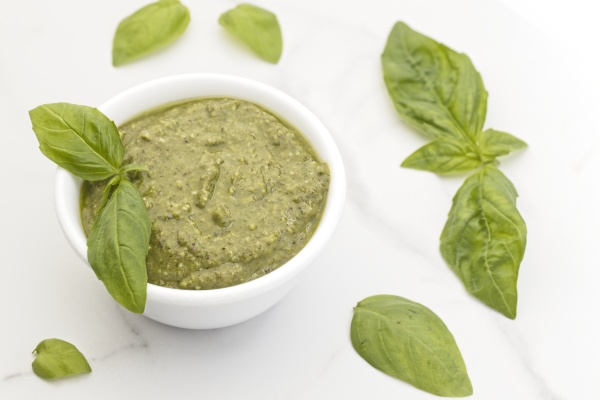 delicious pesto and basil leaves