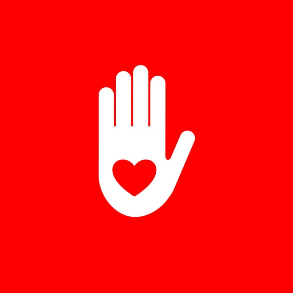isolated red heart in white hand