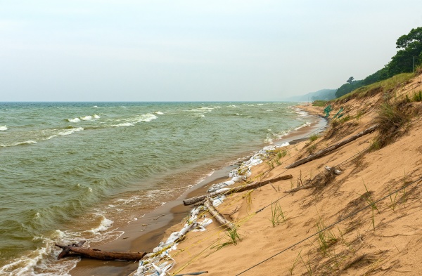 sandbagged lakeshore fighting the erosion from
