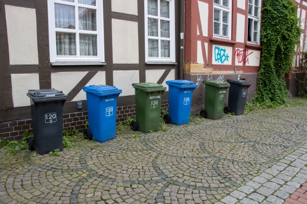 garbage cans in front of residential