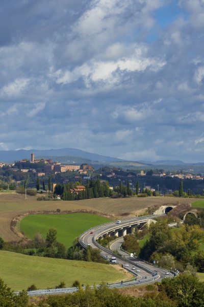 typical tuscan landscape withr siena town