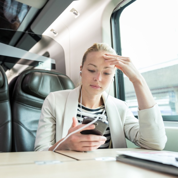 businesswoman communicating on mobile phone while