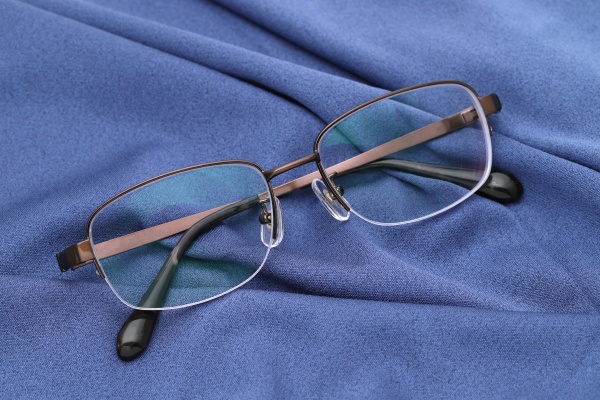 stylish eyesight glasses and blue glass