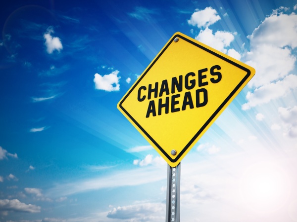 changes ahead sign against blue sky
