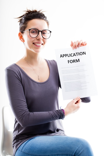woman showing an application form