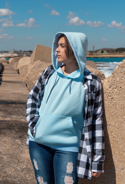 teenager girl in light blue hoodie